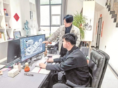 <br>          ■3月4日，在保定市曲阳县河北红雀雕塑设计有限公司，公司负责人甄小卜（站立者）正指导员工对产品进行设计优化<br><br>        